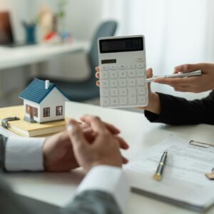 Real estate agent showing financial rate home loan for sign agreement customer the contract legally